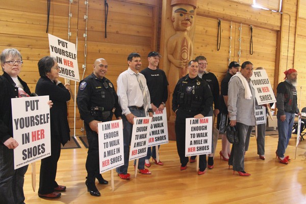 Men and women in Suquamish walk for domestic violence awareness -- and the men wore the high heels.