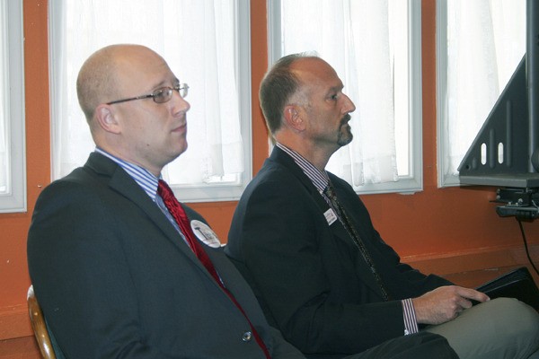 County Commission candidates Chris Tibbs and Rob Gelder participate in a candidates forum in Port Orchard