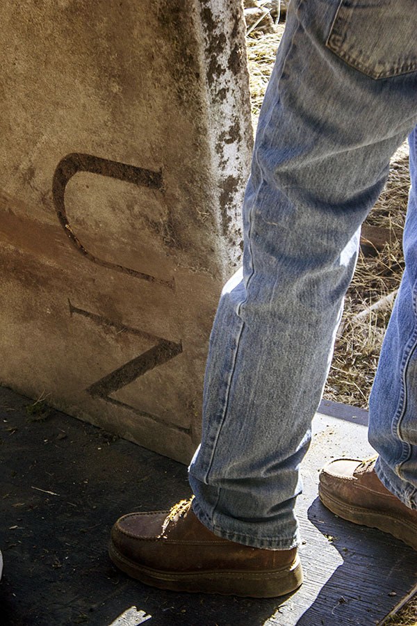 The 85-year-old capstones for the old North Kitsap Union High School were found buried at Raab Park in June. They are being restored by students as a 'legacy project.'