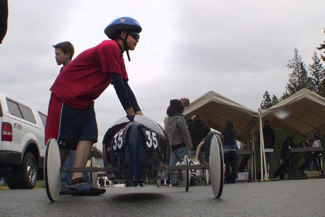 Local racer Josh Monette gets ready for his race Saturday. The soapbox race season in Poulsbo kicked off with 60 racers on April 17 and 18.