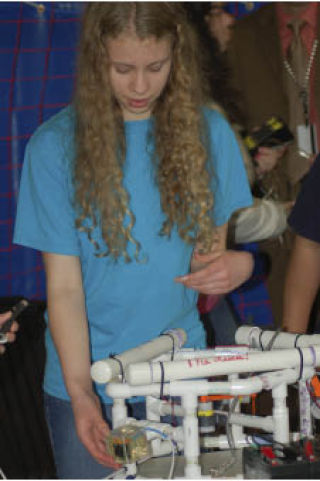 Bremerton High School student Erin O’Brien works on a remotely operated vehicle (ROV) at the Olympic High School pool. She has been accepted to the Massachusetts Institute of Technology (MIT) and plans to pursue a degree in chemistry.