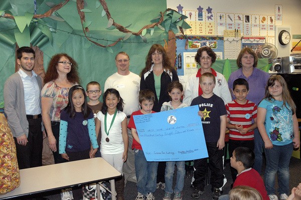 Gayle Collins’ second-grade class at Poulsbo Elementary School raised $248.71 and collected supplies for the West Sound Wildlife Shelter on Bainbridge Island. The campaign was spurred by a classmate’s rescue of two endangered bunnies.