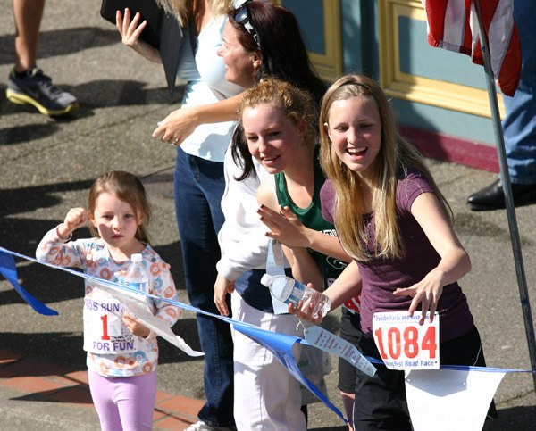 Crowds cheer the finishers in the Viking Fest Road Race