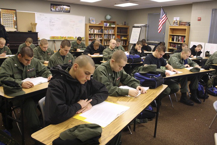 Kristin Okinaka/staff photo Students read an excerpt in their English class at the Washintgon Youth Academy in Bremerton Dec. 1. The academy