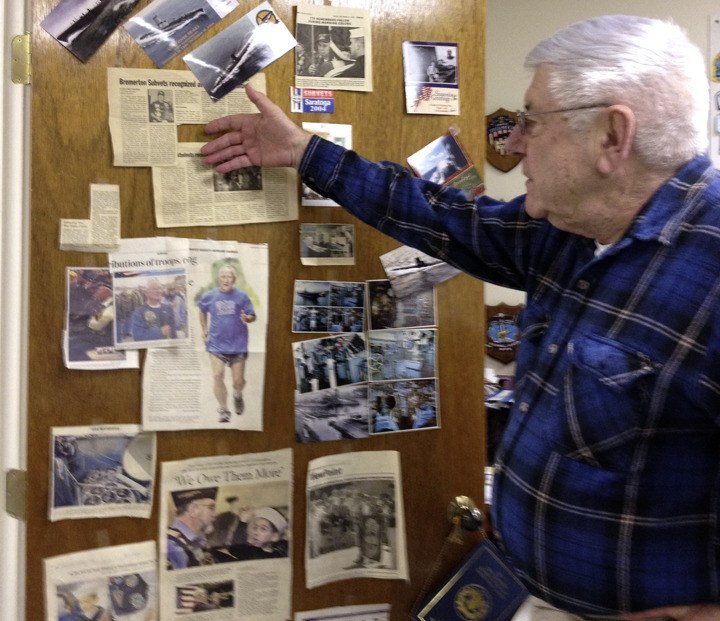 Fred Borgmann shows off clipping of the sub vets activities.