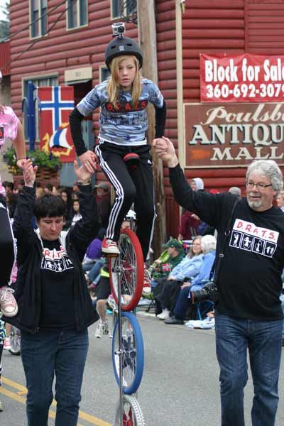 Breidablik fifth grader Alex Dudley maneuvers down Front Street in Poulsbo on the Triple Stack unicycle during the Viking Fest parade.