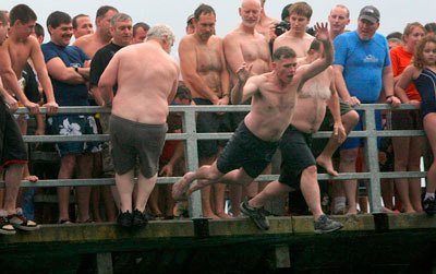 John Sheridan of Port Orchard started 2010 by jumping into the Olalla Lagoon Friday.