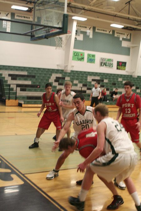 Eagles forward Lennie Hartford tries blocking out a Port Townsend High School player during a Jan. 13 makeup game.