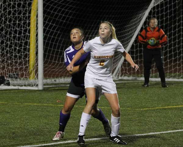 Sequim junior Vianey Cadenas and Kingston junior forward Rebecca Tafte position themselves in front of the Sequim goal as the soccer ball comes down from a throw-in during the Olympic League Tournament game Oct. 25 at Buc Field.