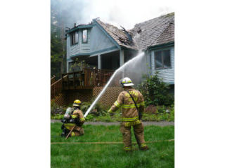 Central Kitsap Fire & Rescue crews at the scene of a fire in Seabeck. Although there have been no reported fire-related deaths in Kitsap County in 2009 so far