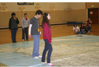 Students at Ridgetop Junior High School attempt to land on the right answer March 19 using an interactive map provided by the National Geographic Society.