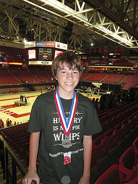 Andrew Simon’s T-shirt says ‘History is not for wimps.’ He should know: His paper on the Trans-Alaska Pipeline won second place in the National History Day competition in Maryland.