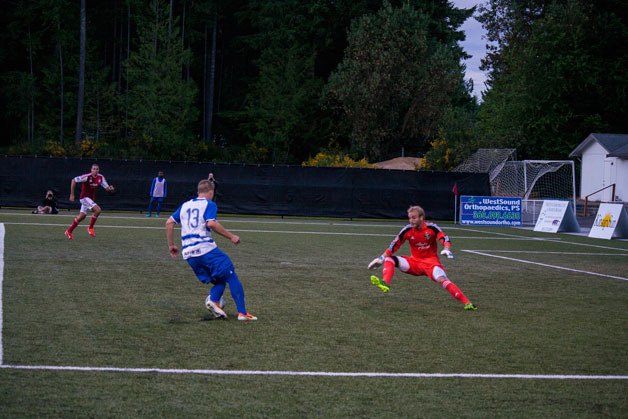 Pumas forward Will Daniels brings Timbers goal-keeper David Meves out of his box in the Pumas closest chance of the evening. Daniels was later brought down in the box but no penalty was called.