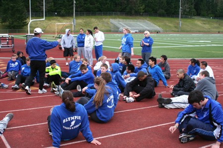 The Olympic High School track and field team practices Monday at Silverdale Stadium. The Trojans