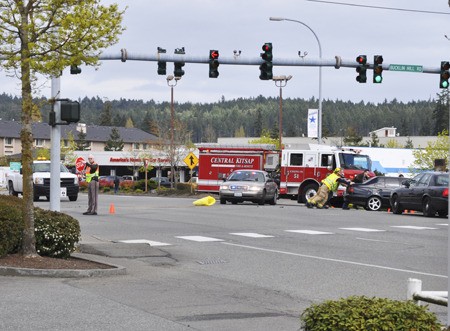 Dump truck rolls over, two-car collision on State Highway 3