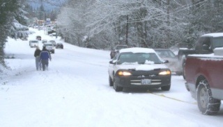 Motorists were taking their chances trying to scale Mile Hill Drive in Thursday's snowstorm.