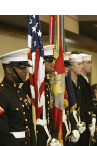 The Naval Base Kitsap (NBK) color guard performs during NBK-Bangor’s ceremony Feb. 26 to recognize the 1