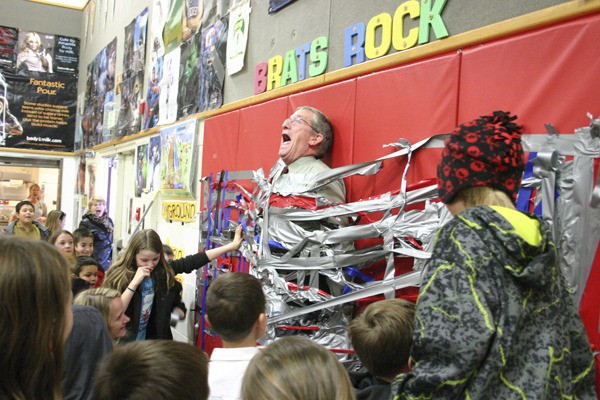 Breidablik interim principal Gary Stebbins is taped to the wall of the Breidablik Elementary School Gymnasium Dec. 20.