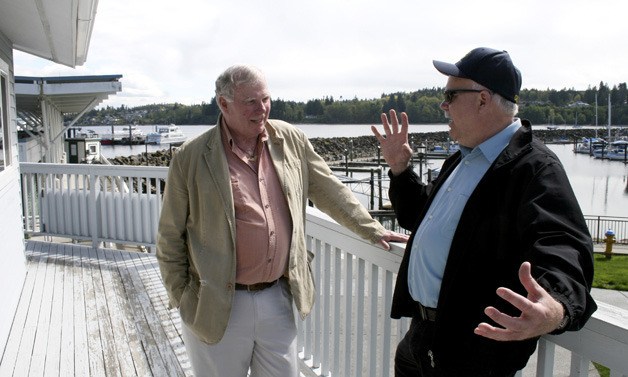 Port of Kingston Commissioner Pete DeBoer (left) chats with new SoundRunner Operations Manager Ken Brazeau Tuesday outside the port office.