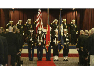 Jesse Beals/staff photo  The Naval Base Kitsap (NBK) color guard performs during NBK-Bangor’s ceremony Feb. 26 to recognize the 1