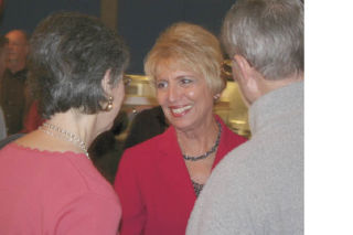 Jan Angel visits with supporters at Amy’s by the Bay in Port Orchard as early ballots showed her winning a seat in the Legislature.