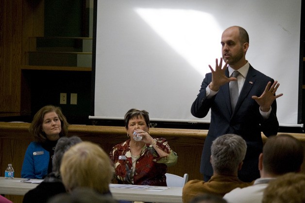 Rep. Drew Hansen addresses a question about background checks for gun owners during a public Town Hall meeting last week in Silverdale.