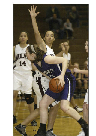 South Kitsap’s Chelnesha Thuring sets up to block a Sunset