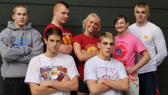 Kingston State wrestlers back from left