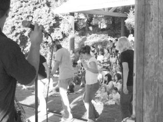 Audience members get into the act at a Concert by the Bay last summer.