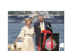 Kitsap Bank Chairman of the Board Helen Langer Smith and President Jim Carmichael were part of the bank’s centennial in Friday.