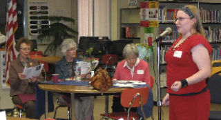 Fairview Junior High School Poetry Club President Amanda Funari delivers lines from Shakespeare’s Sonnet No. 18 to a rapt audience of East Bremerton Friends of the Library members and seniors from around the area.