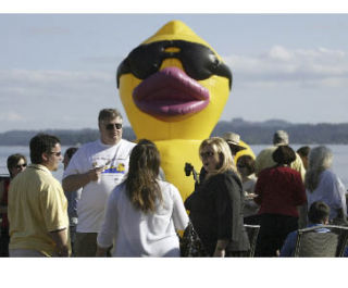 The Great Kitsap Duck Race duck made himself at home among Silverdale Rotary Club members at Thursday’s race kick-off party at the Silverdale Beach Hotel.