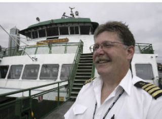 Capt. Dave Frombach has been a Washington State Ferries captain for 17 years. The Poulsbo native currently operates vessels on the Bremerton-Seattle ferry route.