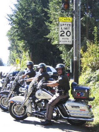 Kitsap County Sheriff’s deputies (from left) Dave Green