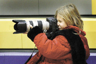 State winner Vicky Camp attended a home Vikings game last season and snapped a winning image from the game. The PTA contest theme was “Helping Others”  and the photo depicted a fellow teammate helping another player.