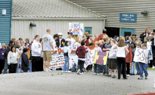 Organizers rallied outside the NK pool complex in June prior to their trek to Poulsbo’s city hall.