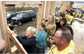 U.S. Sen. Patty Murray (D-Wash.) joined families of the Vetter Homestead to raise a wall during an open house celebration Wednesday in Poulsbo.  Nearly 1