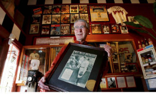 Checkers coffee shop owner Jim Wise is hosting a baseball display at his Front Street location. The artifacts contain original magazine covers