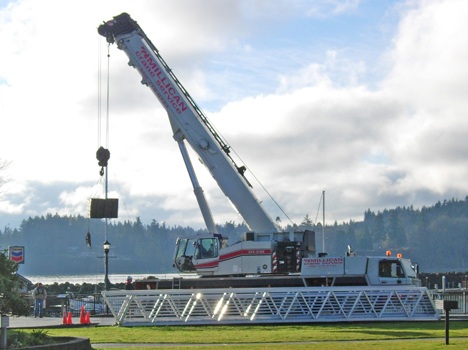 The Port of Kingston replaced its fuel dock ramp last month. Millican Crane Service of Port Gamble lifted the new 40-foot aluminum ramp out to the dock