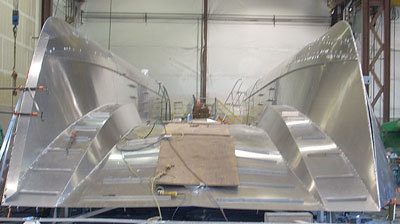 The hull of a new Passenger-Only Ferry vessel being built for Kitsap Transit is shown.