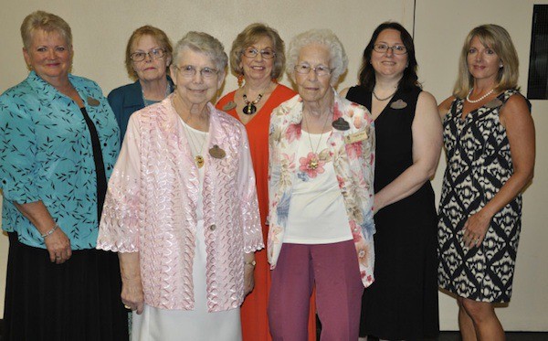 Soroptimist International of Port Orchard members who were honored at a tea earlier this month were