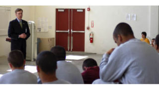 Washington Attorney General Rob McKenna gives a speech to the first-ever cadet class at the Washington Youth Academy during a tour of the facility May 1.