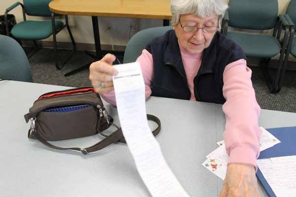 Beverly Staaden shows the receipt for the money she wired to the Dominican Republic.