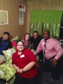 Ashley Furniture HomeStore employees delivered a company- and employee-donated bedroom set to Ashley Nesper of Silverdale