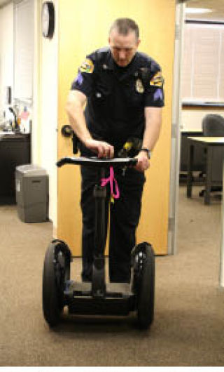 Bremerton Police Sgt. Randy Olson checks out the department’s newly acquired Segway. Westsound Bank donated the two-wheeled vehicle to Bremerton Police.