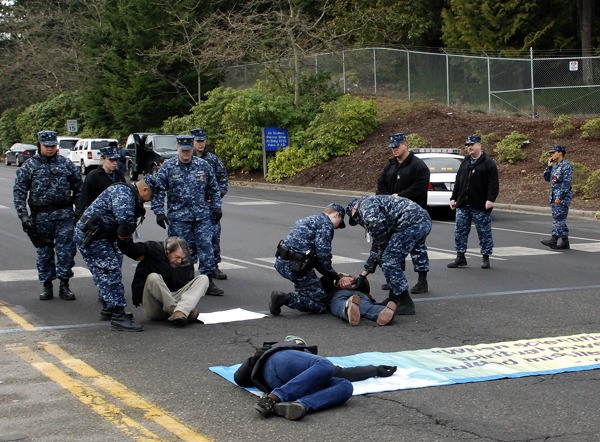 Eight people were cited for trespassing Saturday after they entered Naval Base Kitsap — Bangor as part of a “die-in” to oppose war and nuclear weapons. The eight are members of Ground Zero Center for Nonviolent Action.