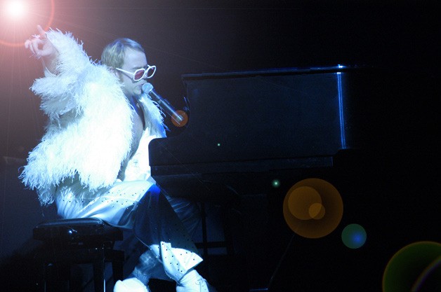 Joel Mason performs as Elton John in a tribute at the Point Casino on June 27.