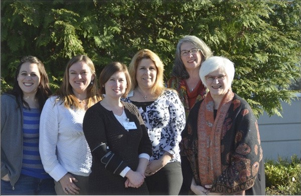 Members of the latest Leadership Kitsap class are building a kiosk and storage shed for the P-patch garden at Kingston’s Village Green. From left