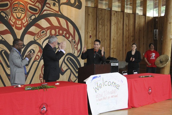 Port Gamble S’Klallam Chairman Jeromy Sullivan raises his hands in thanks to