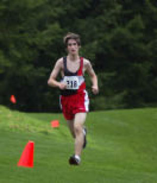 Then-junior Kyle Whitt races at last year’s district championships at Trophy Lake.